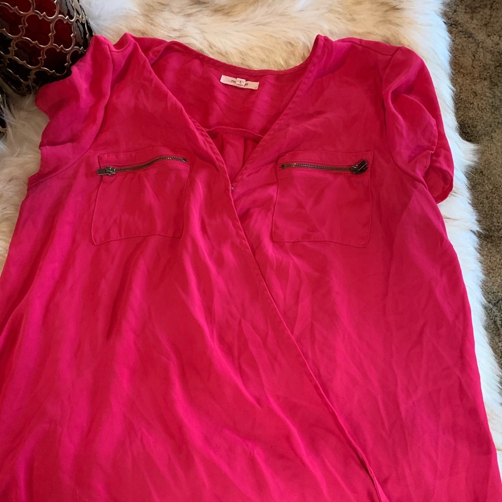 SOLD. Pink top with short sleeves.